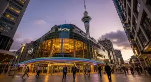 skycity-auckland-casino-and-sky-tower-at-dusk-with-business-professionals-outside